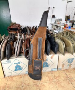 leather rifle case in dark and sand brown with ammo and suppressor pockets