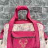 borsa da viaggio piccola in pelle rosa stampa serpente realizzata a mano